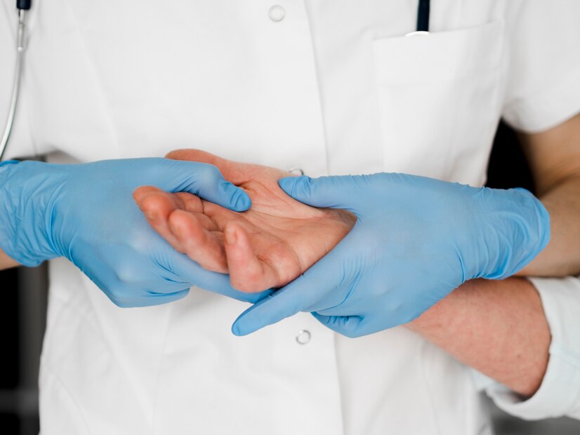 close up doctor checking palm